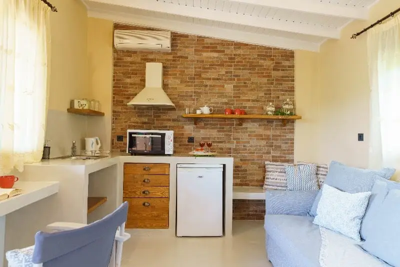 Family Apartment 10 - living room and kitchen - Voulamandis House Chios