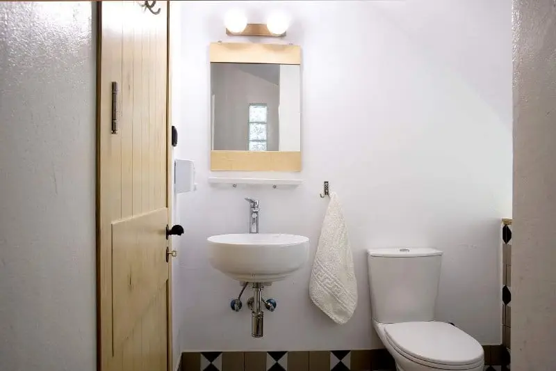 Economy room bathroom and interior details